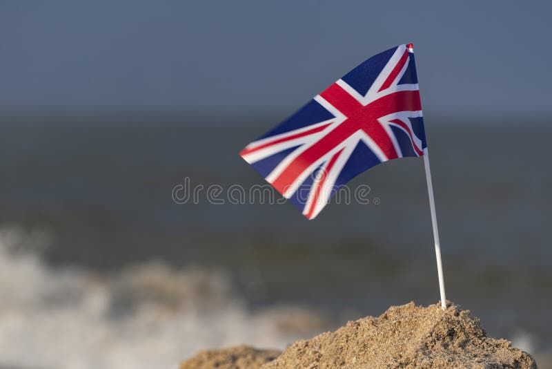 United Kingdom Flag on the Beach. UK Flag. Britain Stock Photo Image