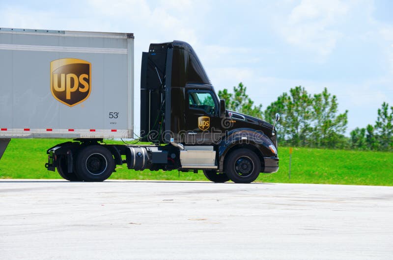 August 20, 2016 - Lakeland, FL, USA: United Parcel Service UPS semi truck making a cargo delivery in central Florida. August 20, 2016 - Lakeland, FL, USA: United Parcel Service UPS semi truck making a cargo delivery in central Florida.