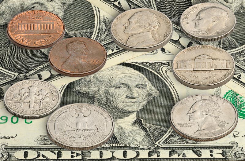 United states coins on one dollar bills stock photography