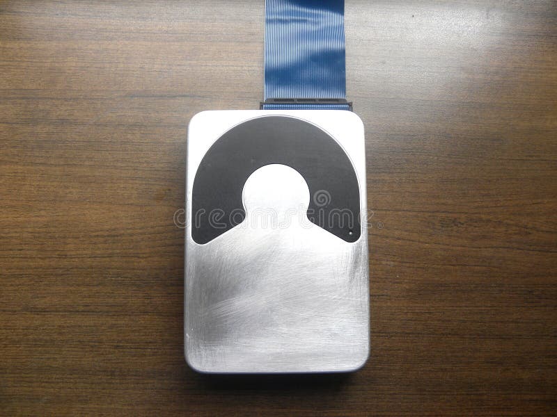 Unité de disque dur en aluminium liée au ruban de câble photos libres de droits Unité de disque dur en aluminium liée au ruban de câble photos libres de droits