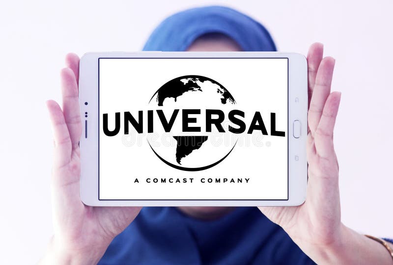 Logo of the american film and television production company universal on samsung tablet holded by arab muslim woman. Logo of the american film and television production company universal on samsung tablet holded by arab muslim woman