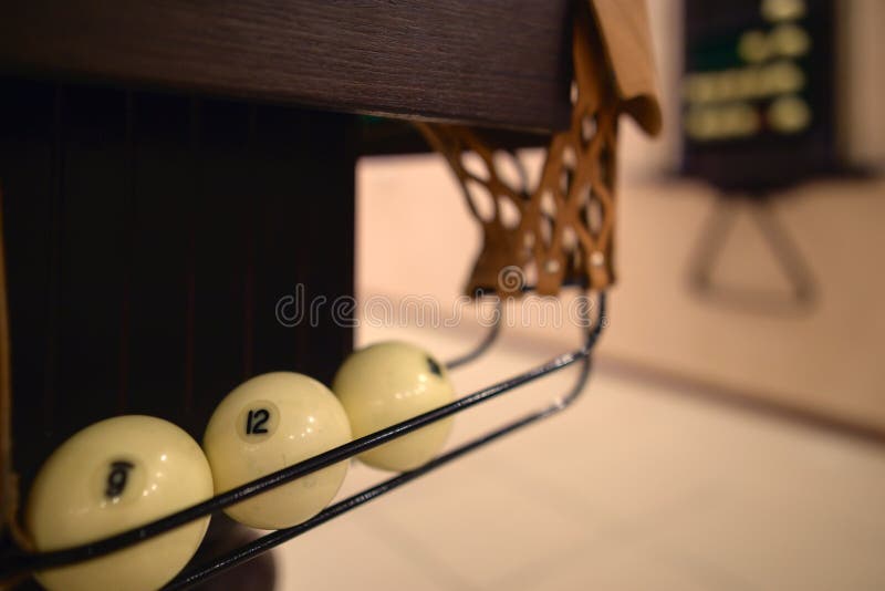 Universal Rack of Billiard Balls and Cues. Stock Image Image of