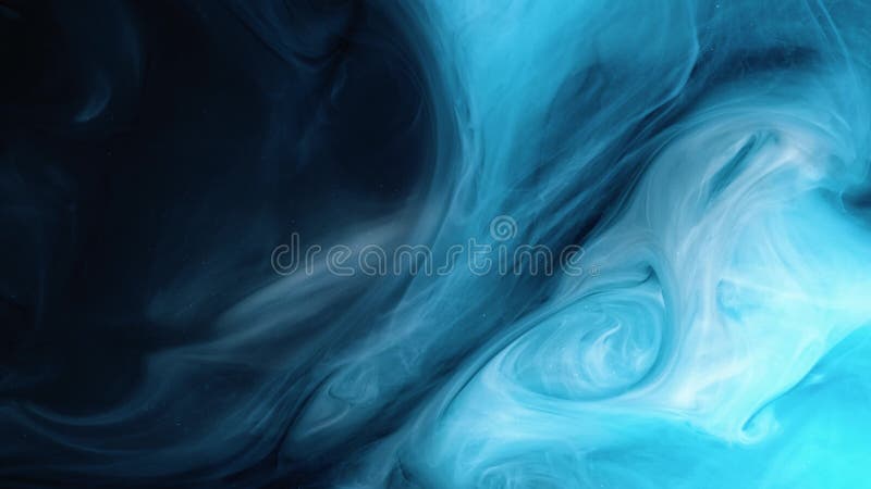 Universe Blue color paint pouring in water. Acrylic colors and ink in water. Abstract frame background. Colors and ink