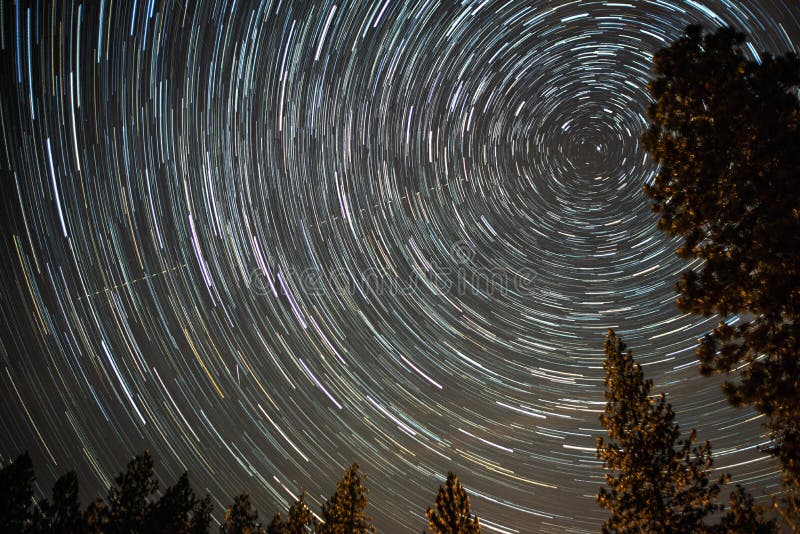 Universe Spiraling Around North Star On Night Sky Stock Photo Image