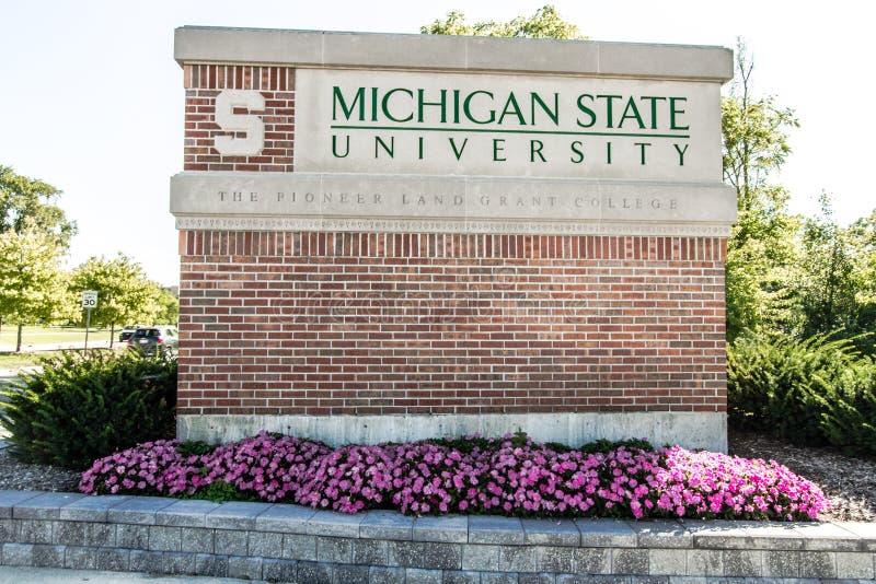 Universiteit van Michigan Emblem en aanmelding bij East Lansing