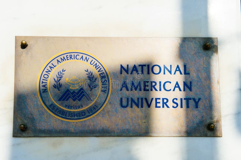 National American University sign on the facade of building entrance. Athens, Greece - 26 Mar 2016: National American University sign university sign on the facade of international study center in Athens, Greece