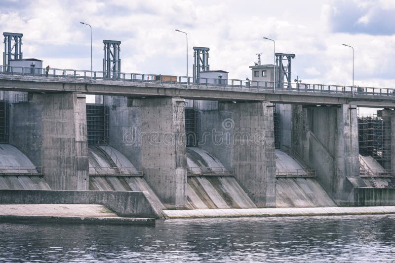 hydro electric power station gates for water - vintage film effect stock photography hydro electric power station gates for water - vintage film effect stock photography