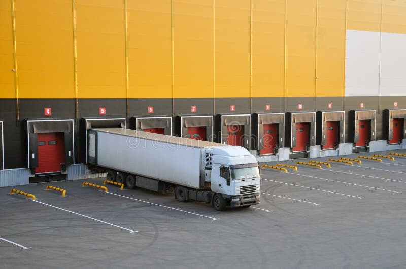 Unloading Trucks at a Modern Warehouse Complex Stock Photo Image of