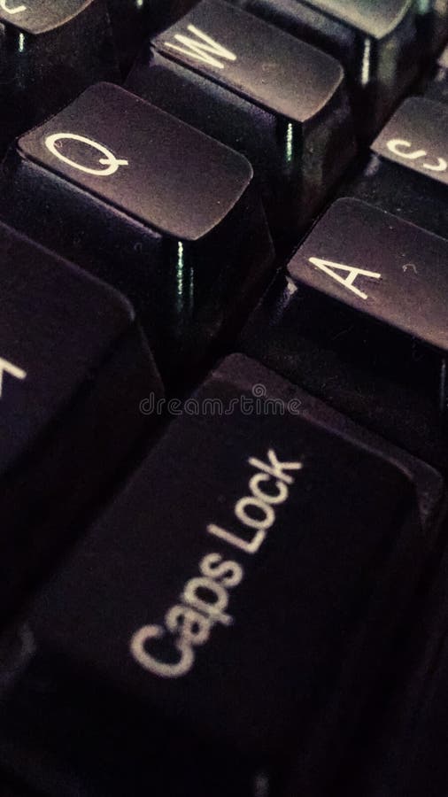 Unlock the caps stock photo. Image of lock, alphabet 116997288