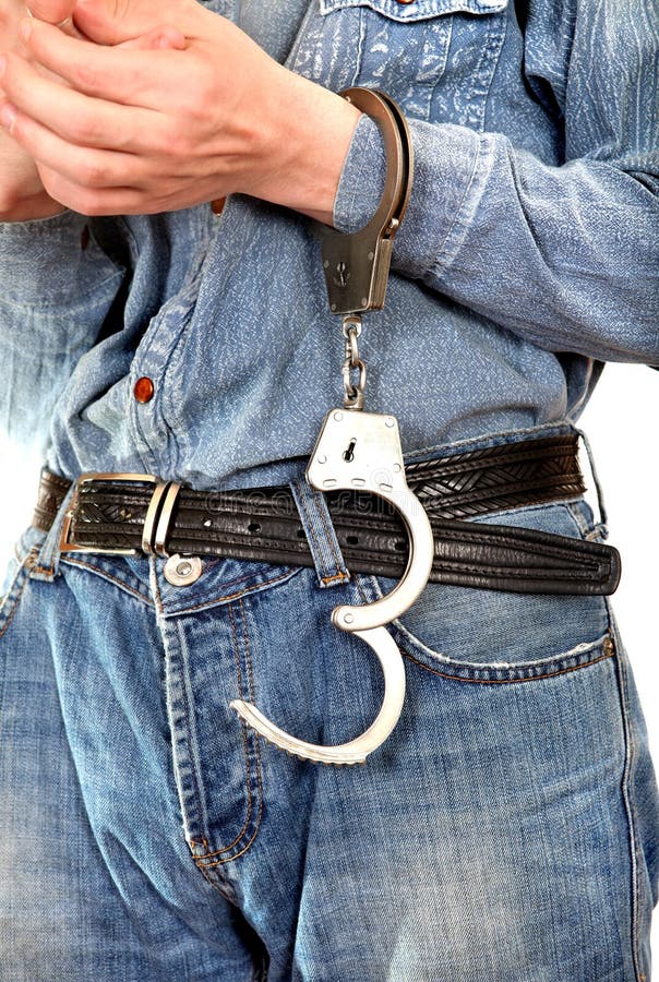 Unlocked Handcuffs on a Hand Stock Image Image of jeans, male 30940559