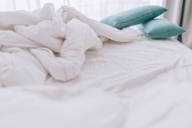 Unmade Bed with Pillows and Messy White Sheets Stock Image Image of