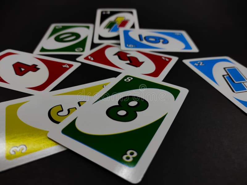 Uno cards in hand, card game Stock Photo by ©Egor_1896 239236398