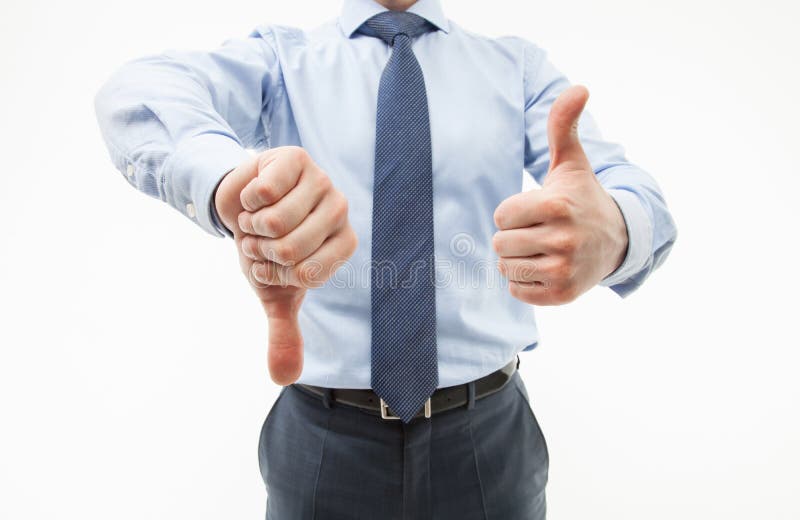 Unrecognizable businessman showing thumb down and thumb up royalty free stock photo
