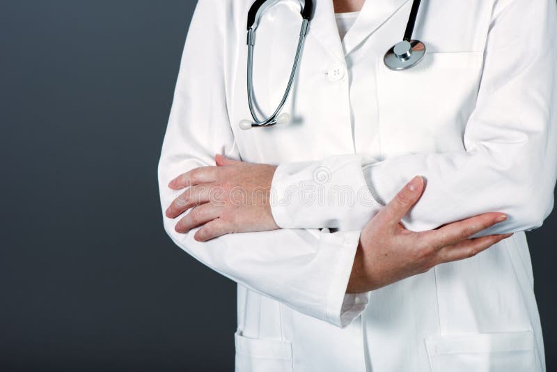 Unrecognizable female doctor posing confident in white medical u stock images Unrecognizable female doctor posing confident in white medical u stock images