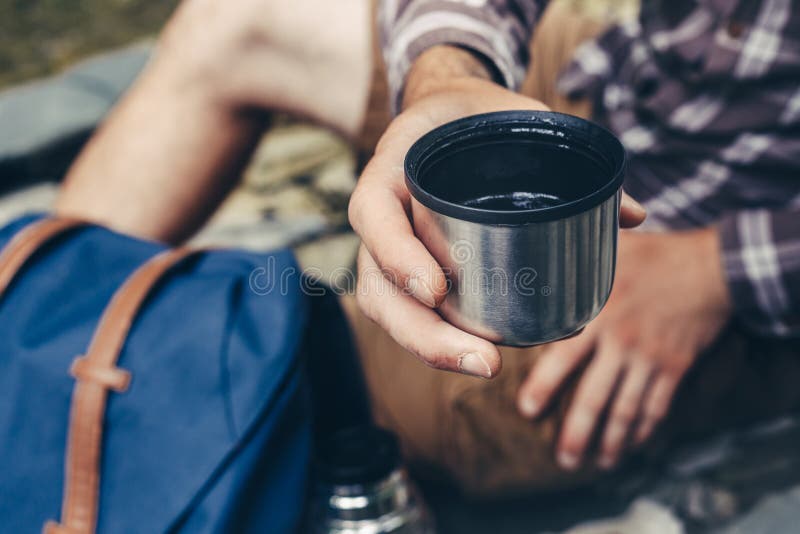 Unrecognizable Hiker Man Pours Tea Or Coffee From Thermos Hiking Travel  Vacation Concept Stock Photo - Download Image Now - iStock