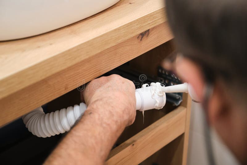 cutting a bathroom sink drain tube