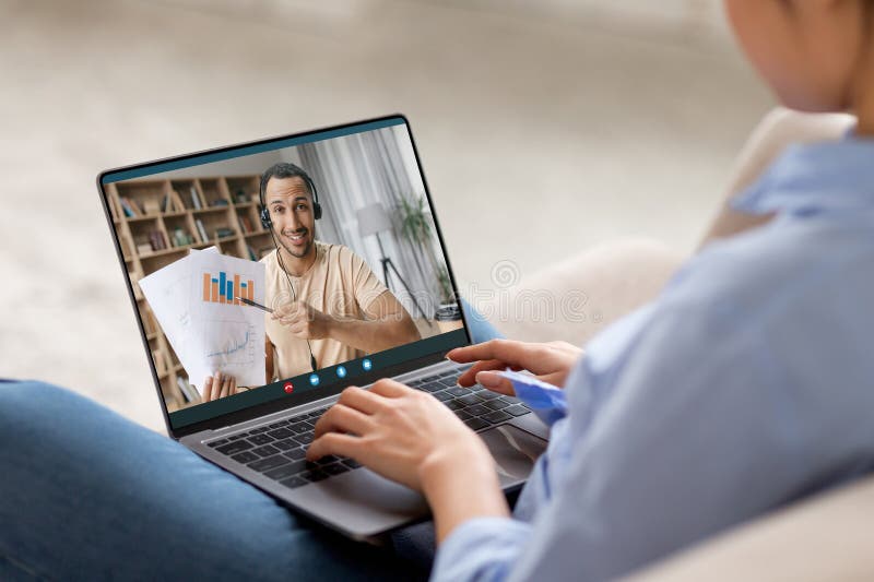 Unrecognizable woman having online lesson with teacher handsome arab man stock images