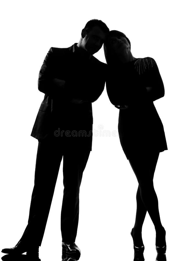 Uns homem e mulher dos pares que estão frente a frente fotografia de stock Uns homem e mulher dos pares que estão frente a frente fotografia de stock