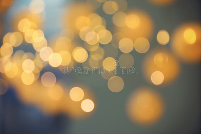 Unscharfe Ansicht von Goldlichtern auf Dunkelheit Bokeh Effekt lizenzfreie stockbilder