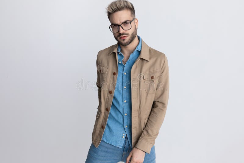 Unshaved Fashion Model In Jacket Standing In A Fashion Pose Stock Photo ...