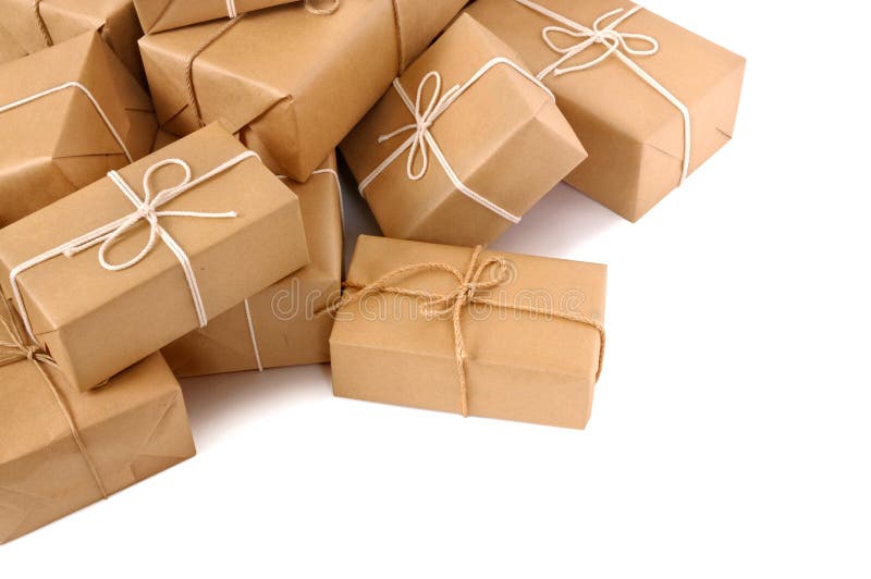 Untidy pile of brown paper packages isolated on white stock images Untidy pile of brown paper packages isolated on white stock images