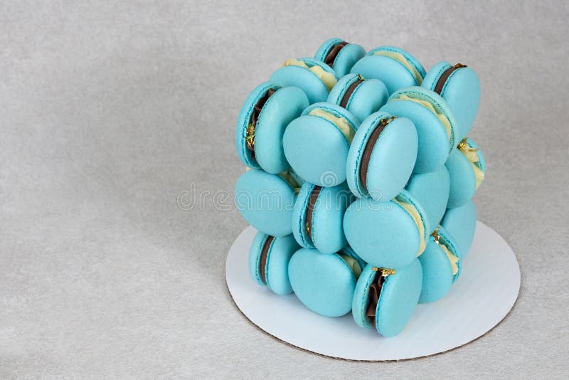 Unusual Almond Blue Macaron Cake. Creative Cake Cube for Holiday Stock