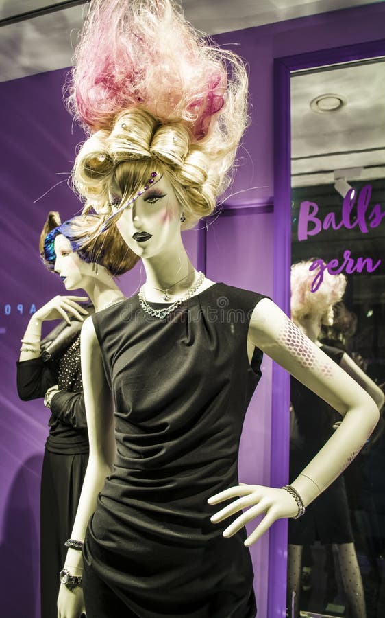 Unusual Dummies and Original Hairstyle. the Girl with Pink Hair and in a Black Dress. Modern Fashion. Stock Photo - Image of dummy, colorful: 142166170 Unusual Dummies and Original Hairstyle. the Girl with Pink Hair and in a Black Dress. Modern Fashion. Stock Photo - Image of dummy, colorful: 142166170
