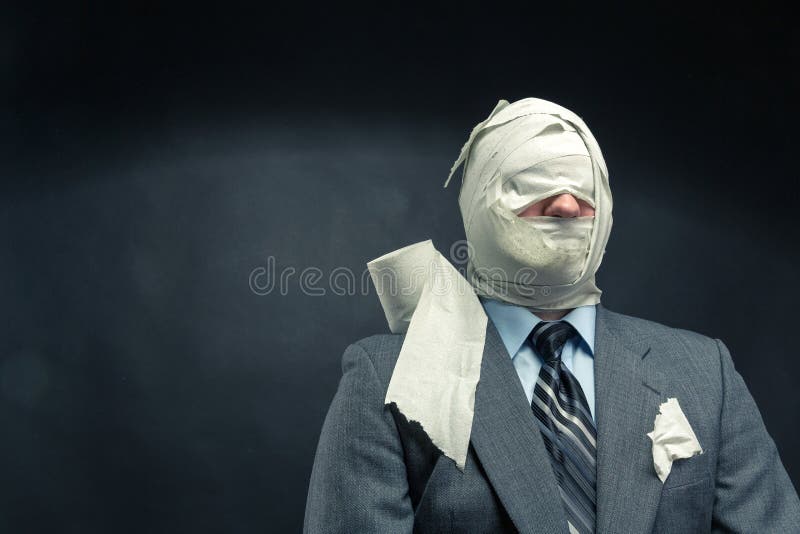 Uomini in carta igienica immagini stock libere da diritti Uomini in carta igienica immagini stock libere da diritti