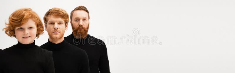 Uomini rossicci in maglione nero fotografia stock