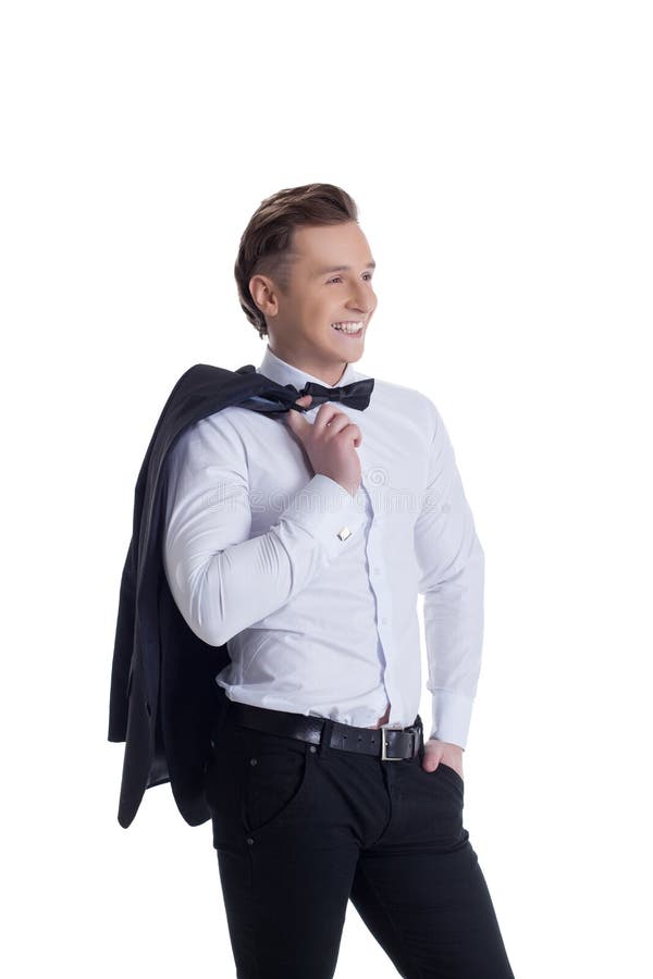 Uomo bello sorridente vestito in vestito convenzionale immagini stock libere da diritti Uomo bello sorridente vestito in vestito convenzionale immagini stock libere da diritti