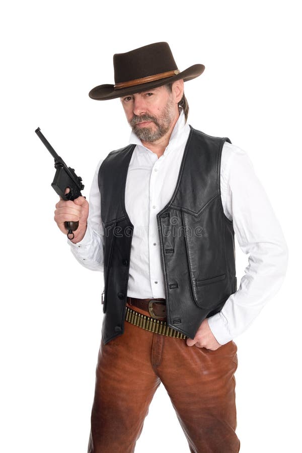Uomo in cappello di cowboy con la pistola fotografia stock Uomo in cappello di cowboy con la pistola fotografia stock