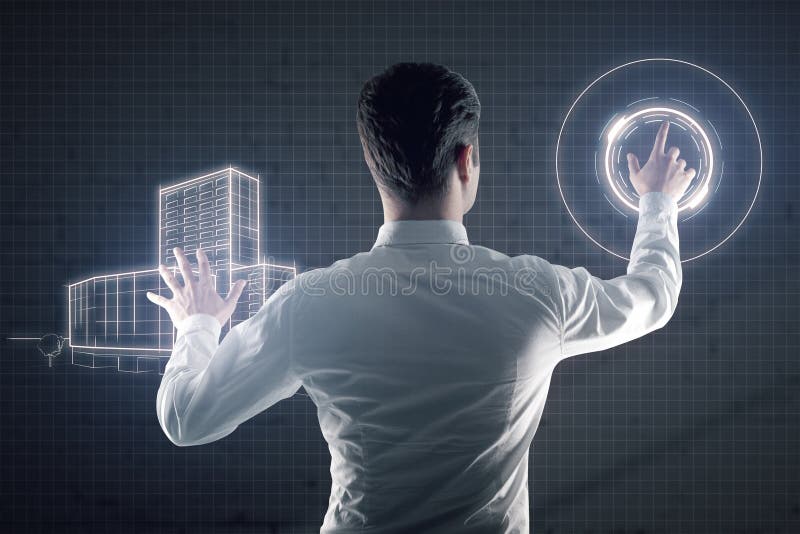 Uomo che dirige progetto di costruzione digitale fotografia stock Uomo che dirige progetto di costruzione digitale fotografia stock