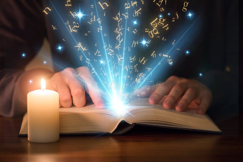 man reading shining book with candle. man reading shining book with candle