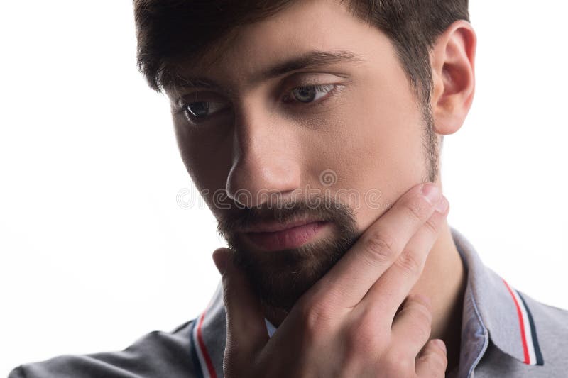Uomo che pensa e che distoglie lo sguardo immagini stock libere da diritti Uomo che pensa e che distoglie lo sguardo immagini stock libere da diritti