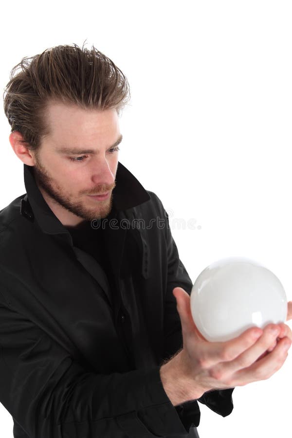 Uomo che tiene una sfera di vetro immagine stock