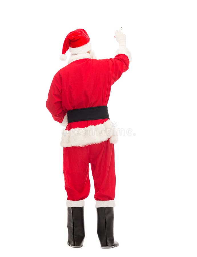 Uomo in costume di scrittura del Babbo Natale qualcosa immagine stock Uomo in costume di scrittura del Babbo Natale qualcosa immagine stock