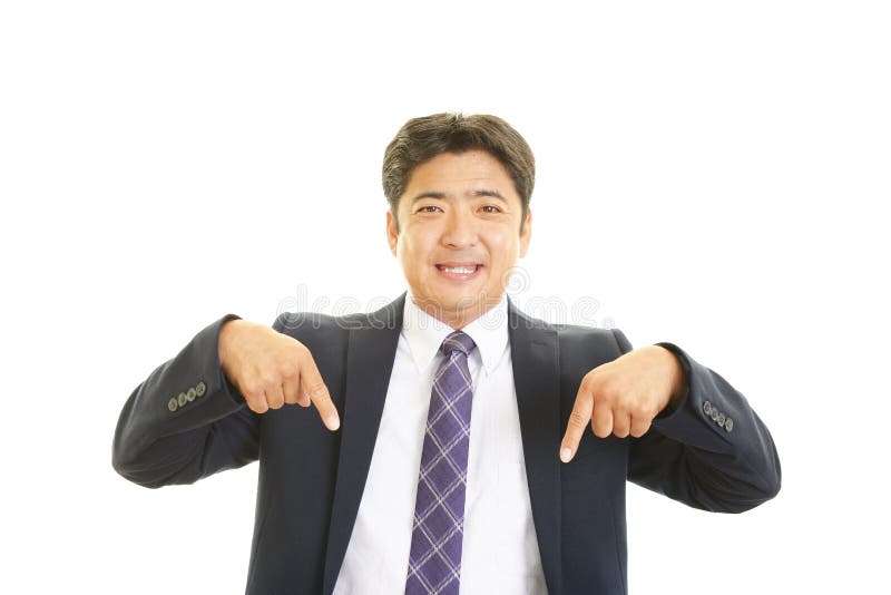 Uomo d'affari asiatico sorridente fotografie stock