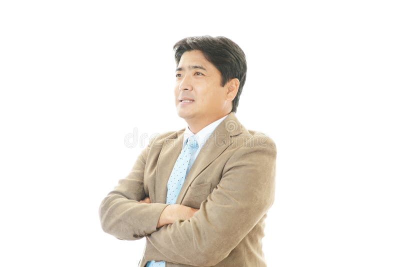 Uomo d'affari asiatico sorridente fotografia stock