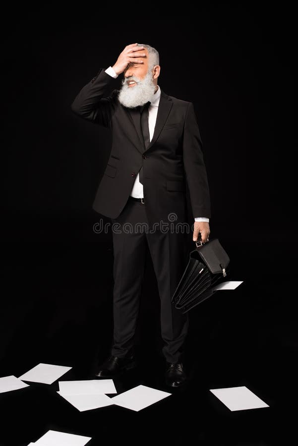 Uomo d'affari che dispone mano attraverso il fronte fotografia stock Uomo d'affari che dispone mano attraverso il fronte fotografia stock