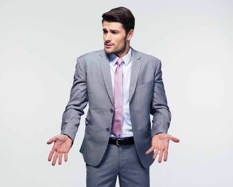 Uomo d'affari che scrolla le spalle le spalle fotografia stock Uomo d'affari che scrolla le spalle le spalle fotografia stock