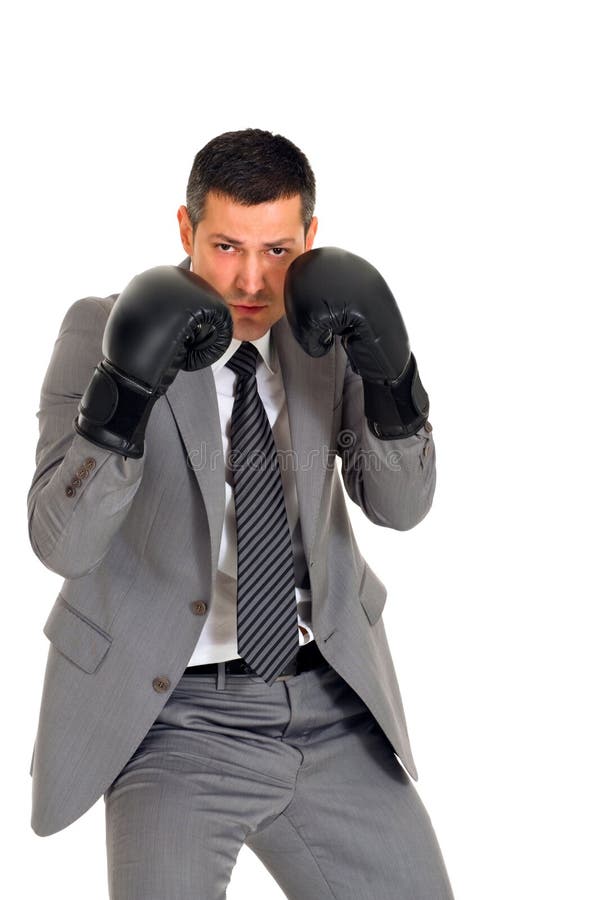 Businessman with boxing gloves in white background. Businessman with boxing gloves in white background