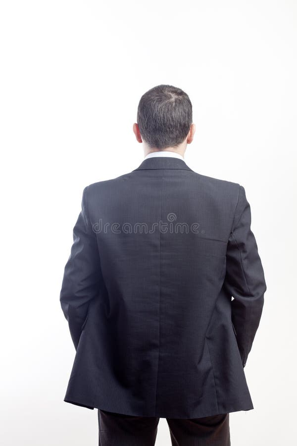 Uomo d'affari dalla parte posteriore fotografia stock Uomo d'affari dalla parte posteriore fotografia stock