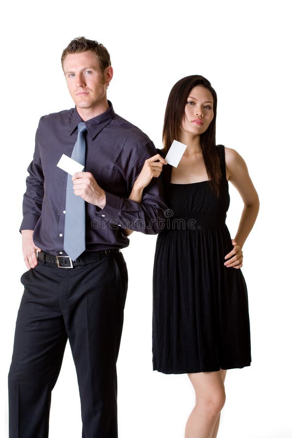 Uomo d'affari e donna che mostrano l'automobile in bianco di bussiness immagine stock libera da diritti Uomo d'affari e donna che mostrano l'automobile in bianco di bussiness immagine stock libera da diritti