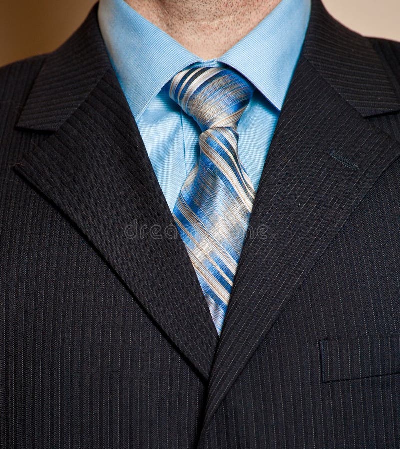 Uomo in dettaglio blu del vestito di affari. immagini stock Uomo in dettaglio blu del vestito di affari. immagini stock