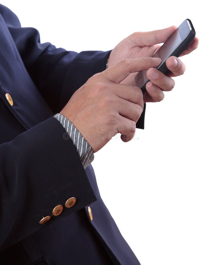 Uomo d'affari che digita sul cellulare fotografia stock libera da diritti