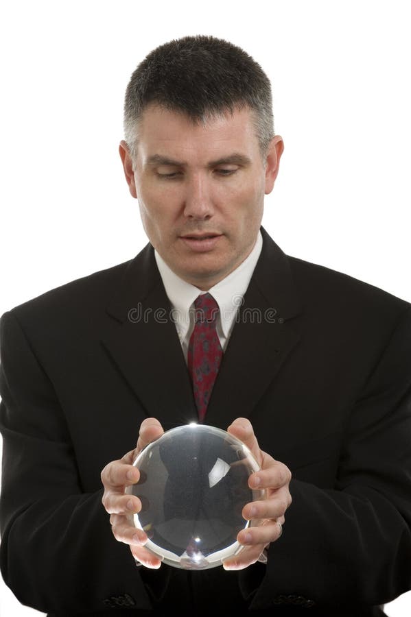 Uomo di affari con la sfera di cristallo fotografie stock