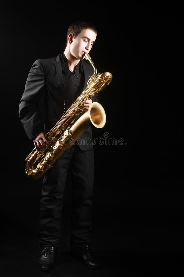 Saxophone baritone jazz music instruments Jazz man with sax. Saxophone baritone jazz music instruments Jazz man with sax