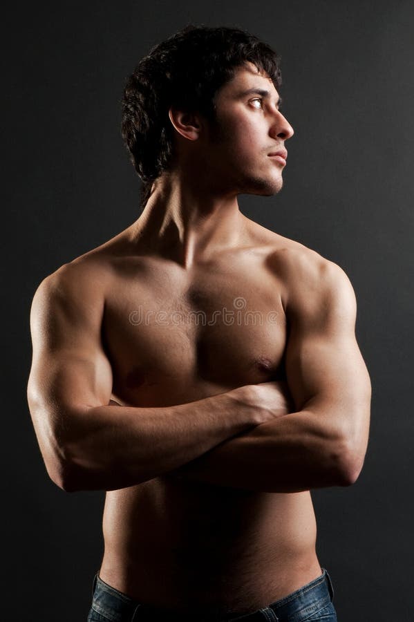 Uomo muscolare bello fotografia stock Uomo muscolare bello fotografia stock