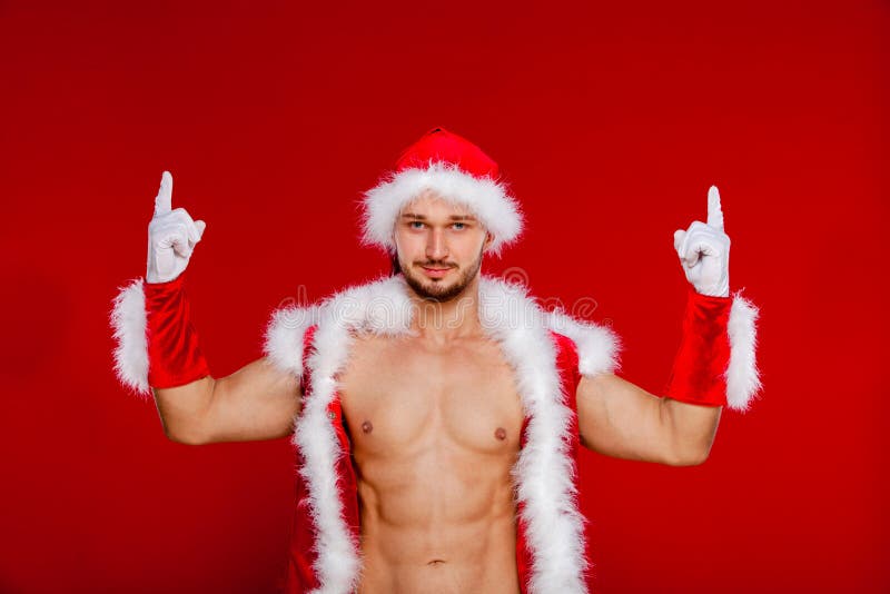 Uomo Muscolare Sexy In Uniforme Di Santa Nuovo Anno Di Natale Immagine Stock Immagine Di Claus