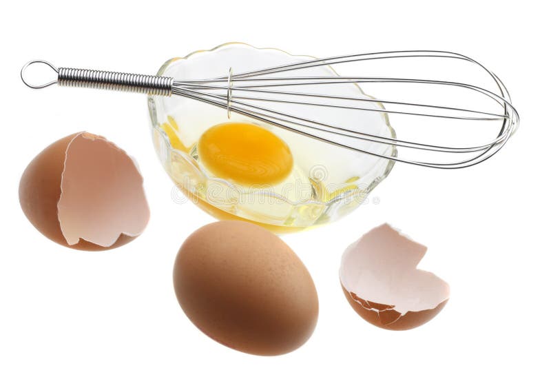 Fresh eggs and a mixing whisk. Fresh eggs and a mixing whisk.